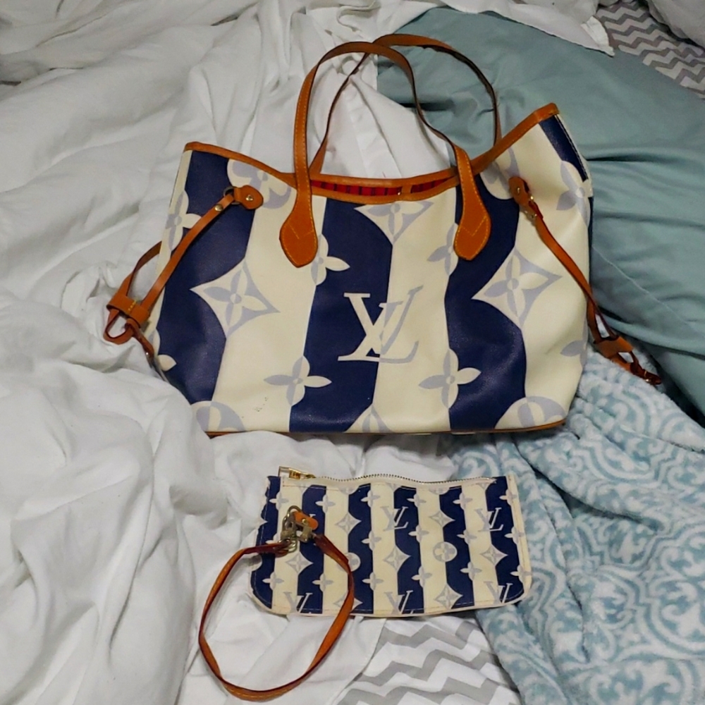 Blue and white bag with wristlet